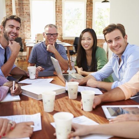 Group Of Office Workers Meeting To Discuss Ideas